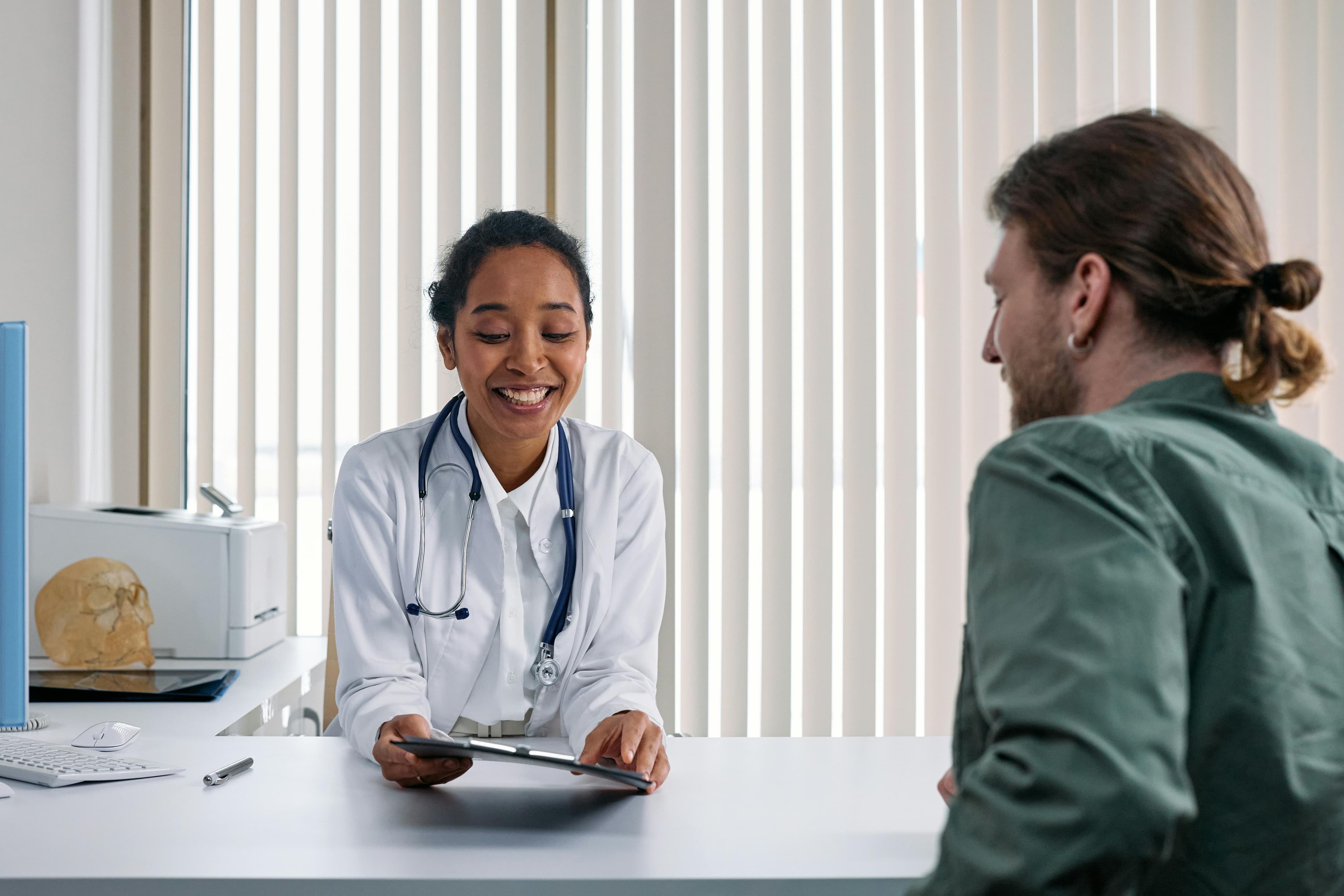 Doctor consulting with a patient in an office